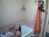 Sexy black amateur caught taking a shower on hidden cam